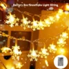 Schneeflocken-Lichterkette 3 m, warmweiß