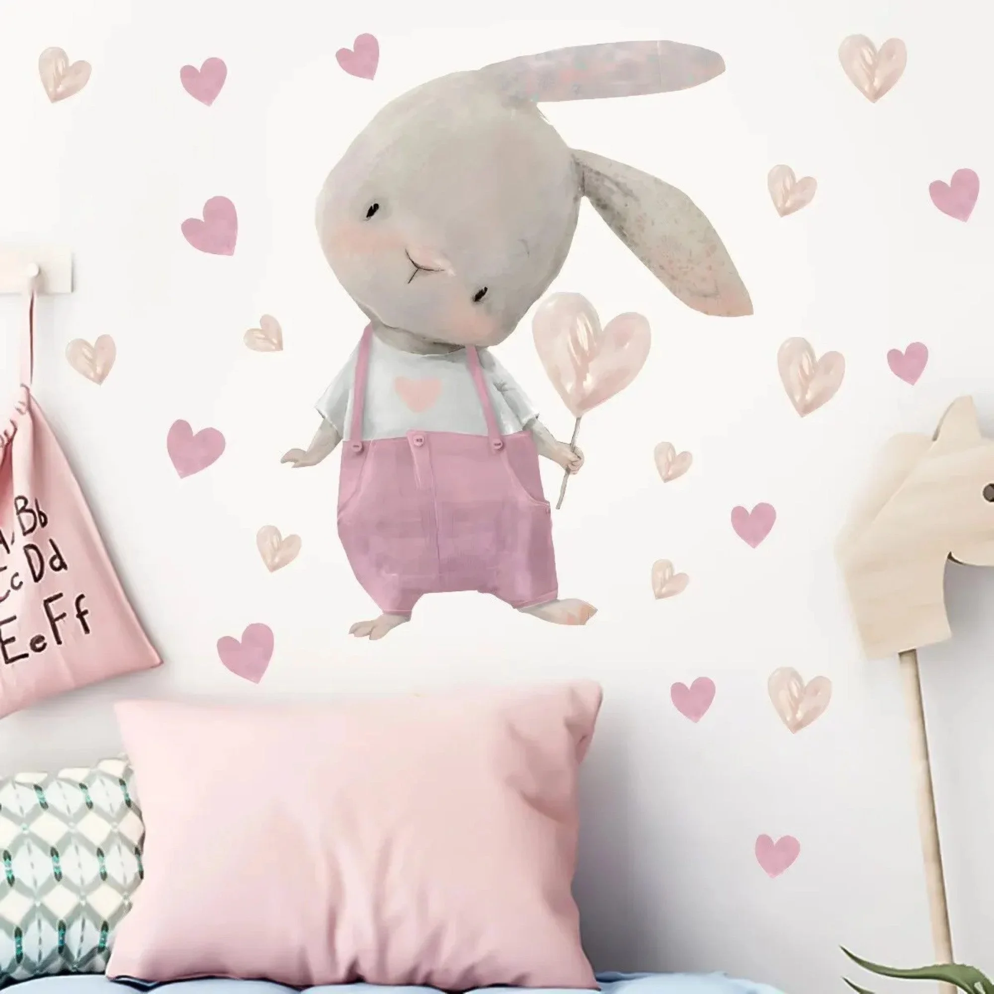 Wandsticker rosa Hase mit Herzen